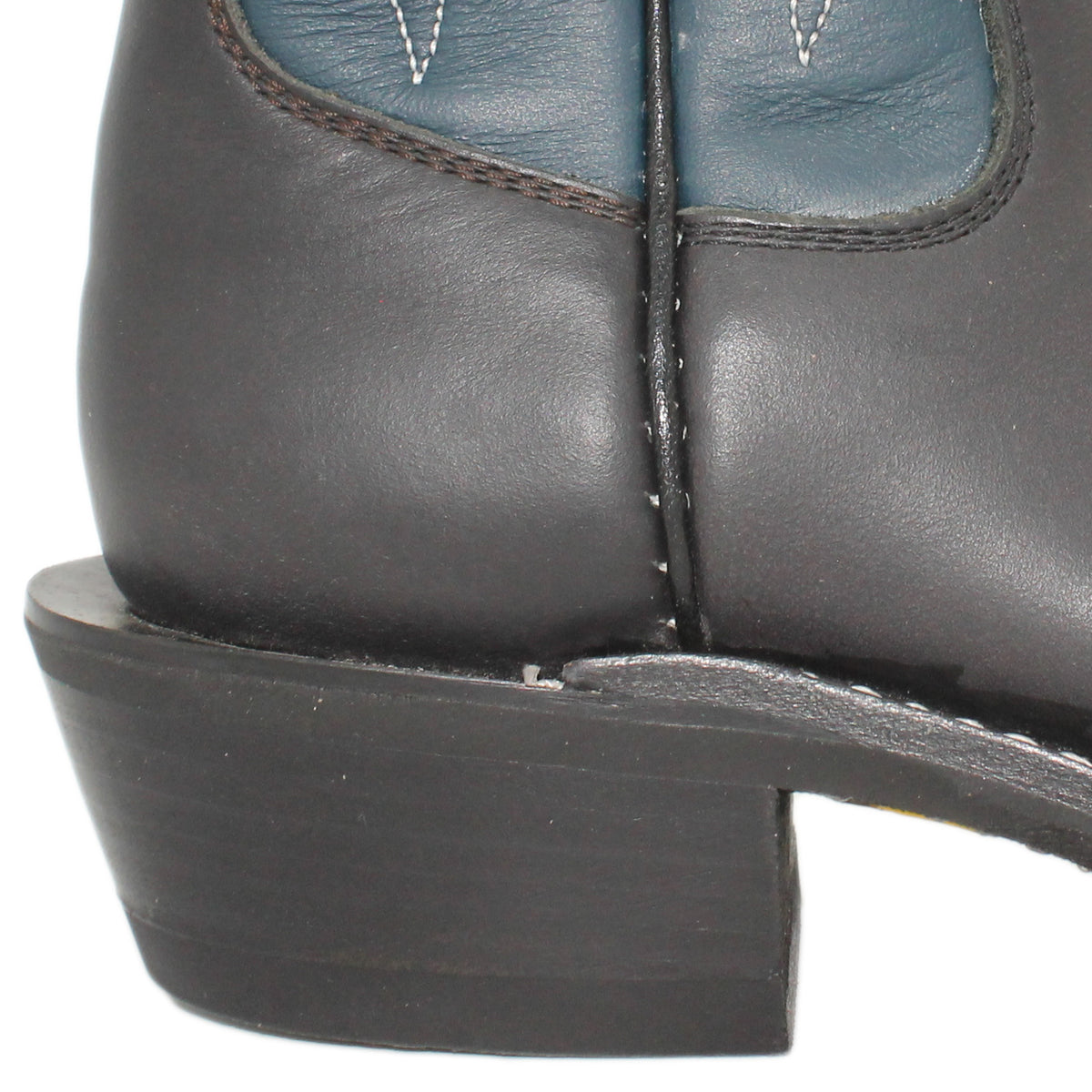 14" Blue Upper w/ Beck Classic Stitching
Black Steer Vamp
Regular French Square Toe
Slightly Tapered Heel