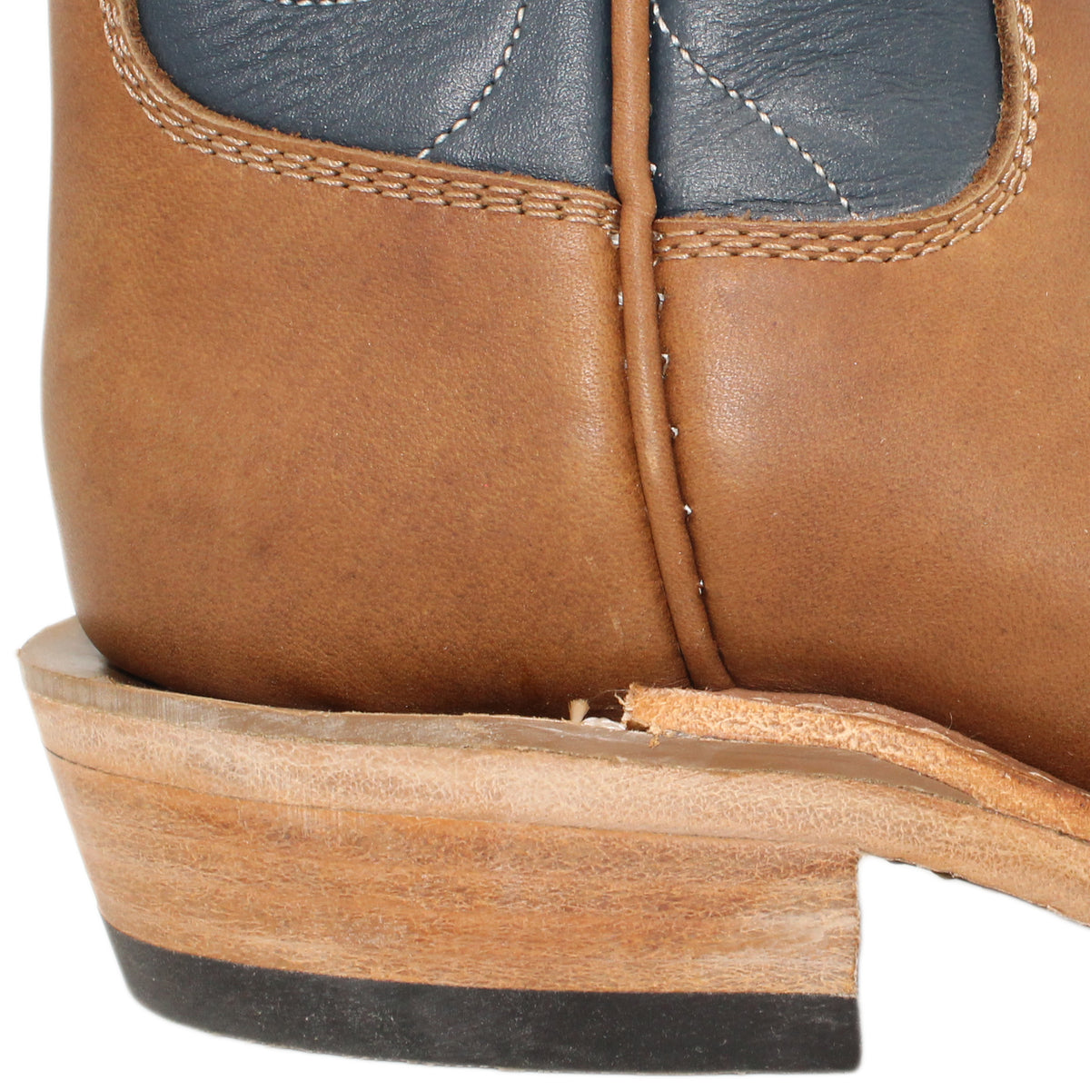 12" Blue Upper w/ Loops Stitching
Saddle Timberjack Steer Vamp
Wide French Square Toe
Slightly Tapered Heel