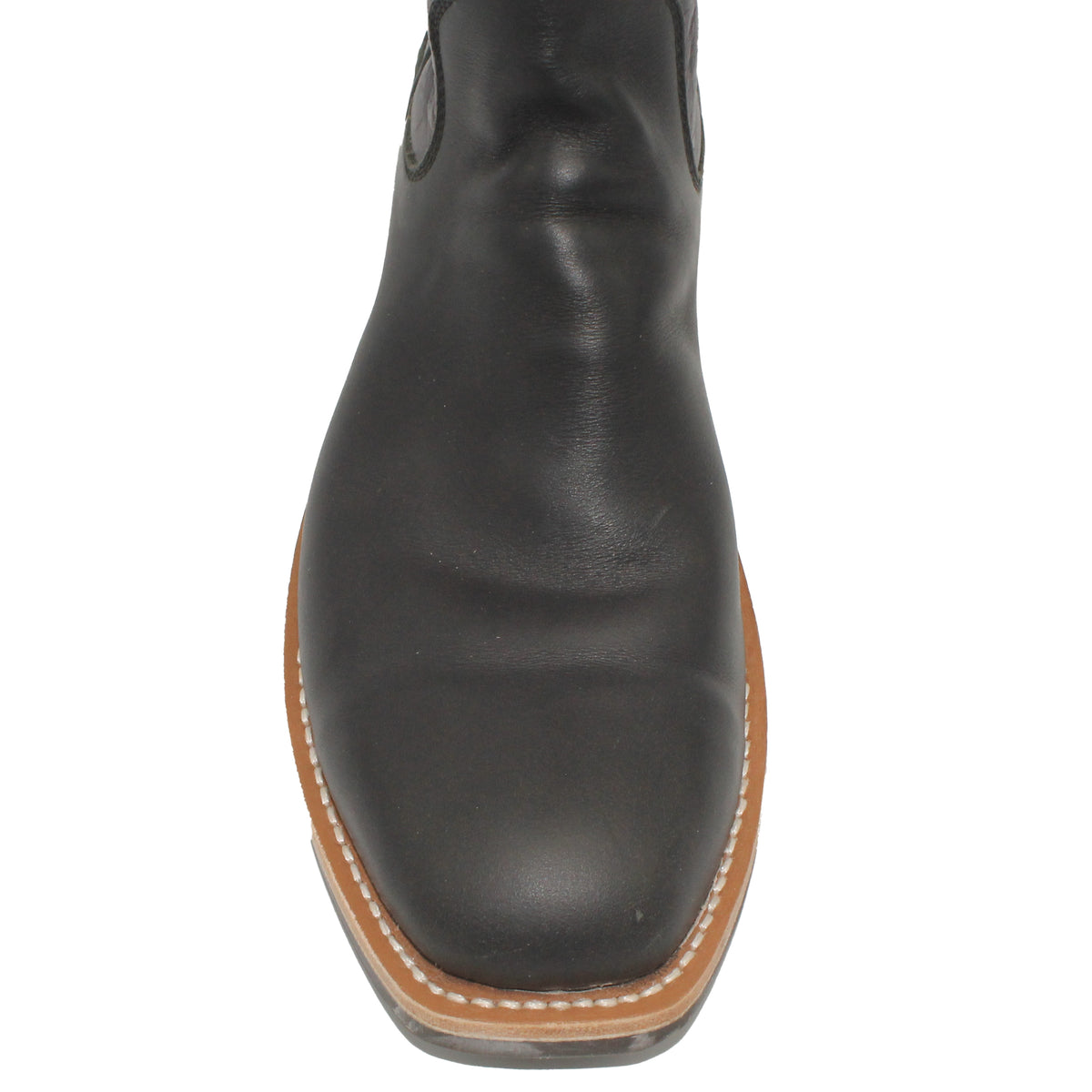 16" Purple Upper w/ Tulip Stitching
Black Steer Vamp
Wide French Square Toe
Slightly Tapered Heel