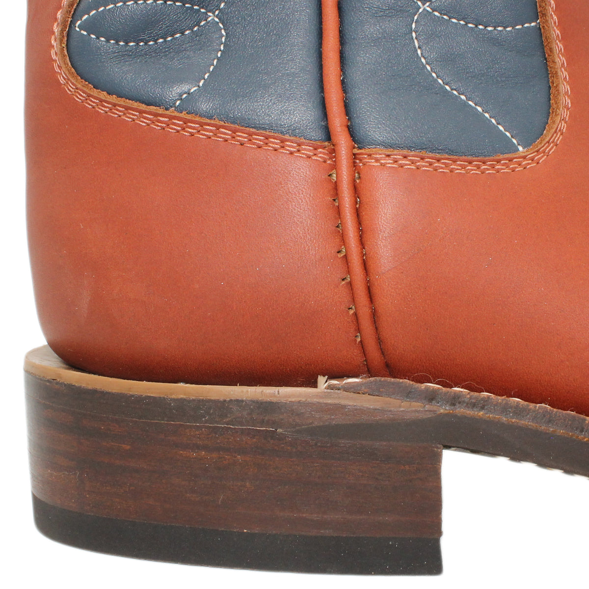 12" Blue Upper w/ Loops Stitching

Tan Timberjack Steer Vamp

Round Toe

Block Heel