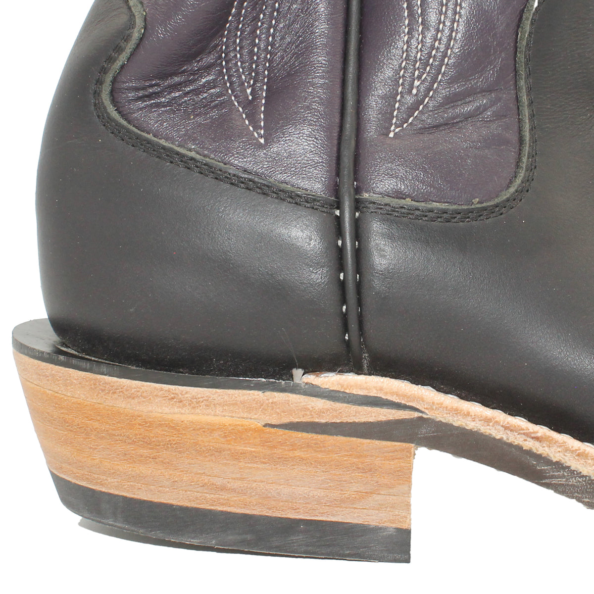 16" Purple Upper w/ Tulip Stitching

Black Steer Vamp

Wide French Square Toe

Slightly Tapered Heel