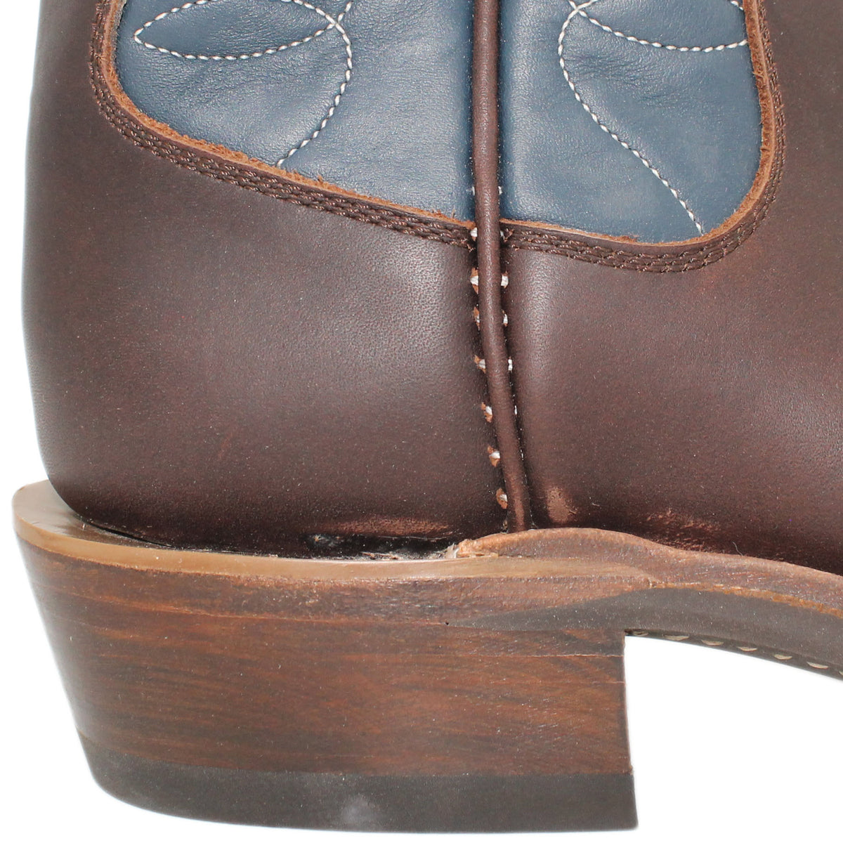 12" Blue Upper w/ Loops Stitching

Brown Timberjack Steer Vamp

Wide French Square Toe

Slightly Tapered Heel