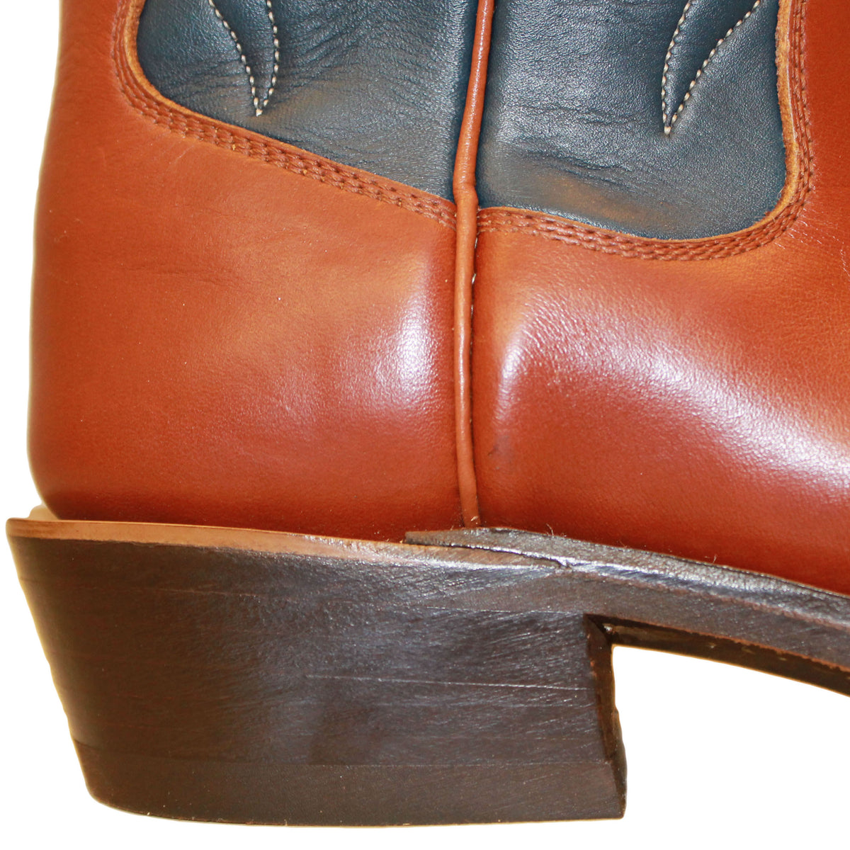14" Blue upper w/ Beck Classic Stitching

Tan Timberjack Steer Vamp

Wide French Square Toe

Slightly Tapered Heel