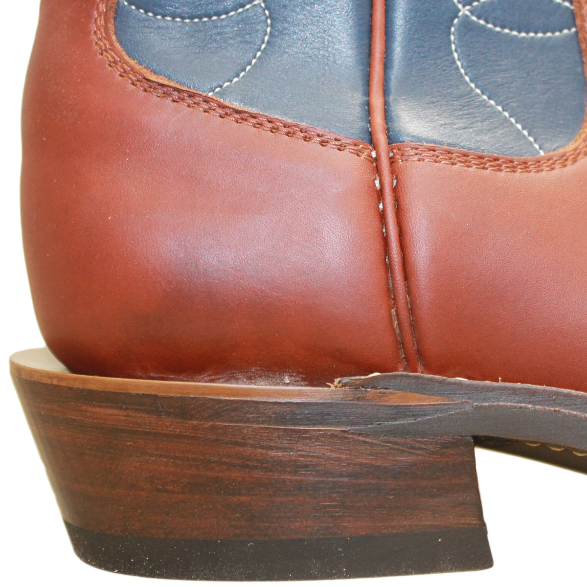 12" Blue Upper w/ Loops Stitching

Tan Timberjack Steer Vamp

Wide French Square Toe

Slightly Tapered Heel