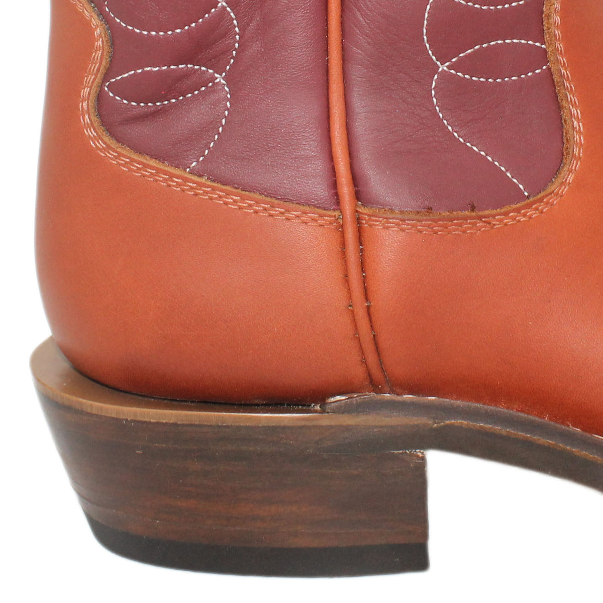 12" Wine Upper w/ Loops Stitching

Tan Timberjack Steer Vamp

Regular French Square Toe

Slightly Tapered Heel
